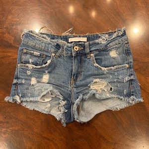 Blue denim ripped jean shorts